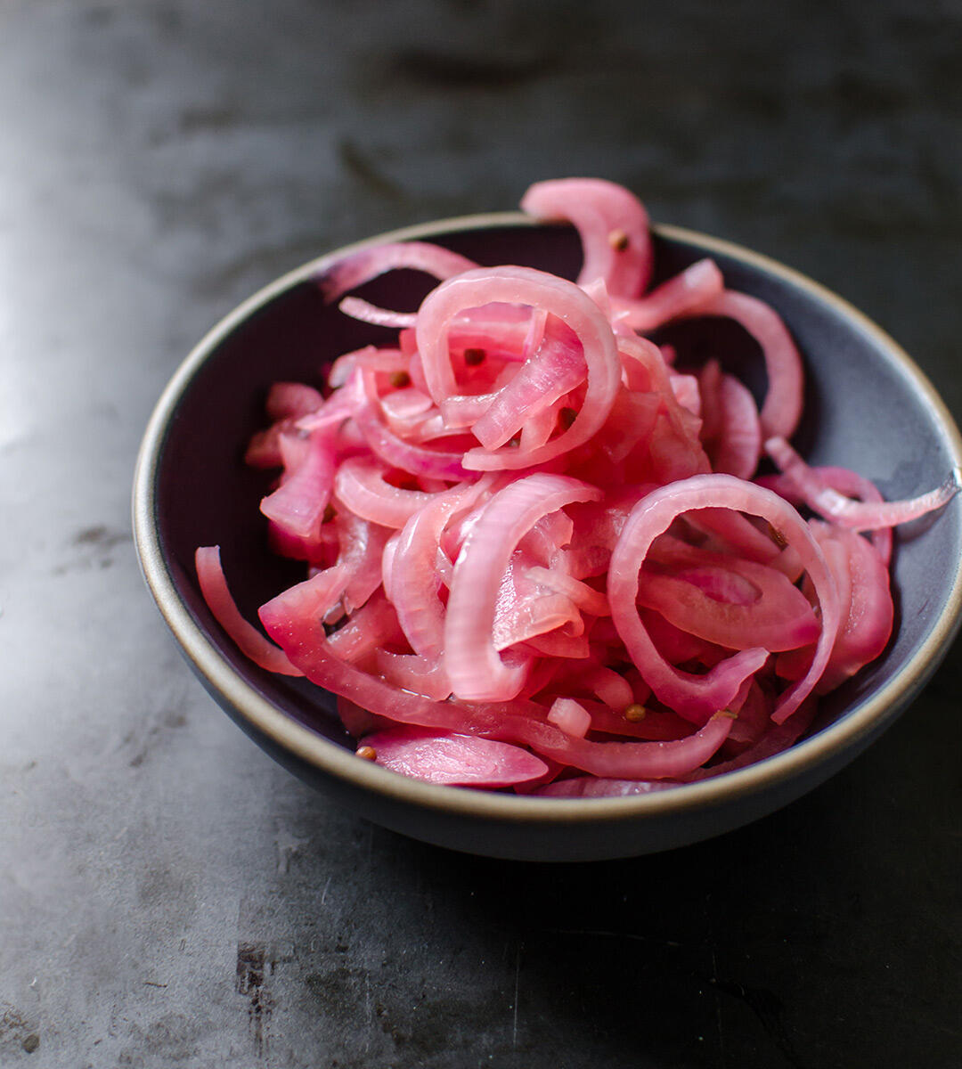 bowl of pickled red onions