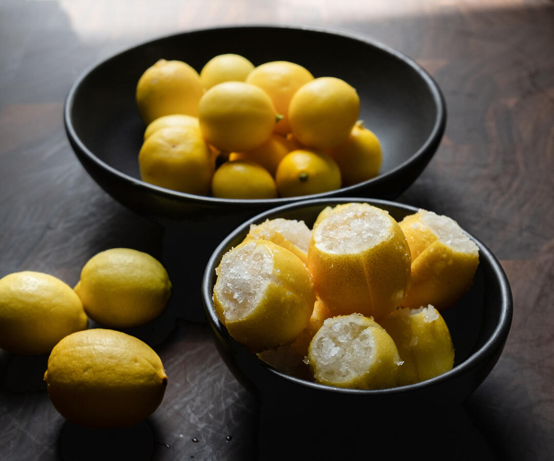 Sliced and salted limequats and lemons.